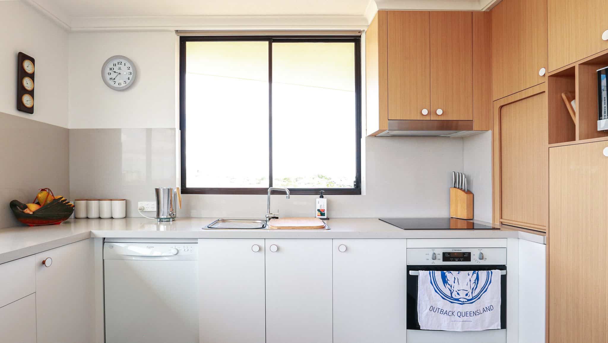 Kitchen makeover with white and wooden aesthetic units