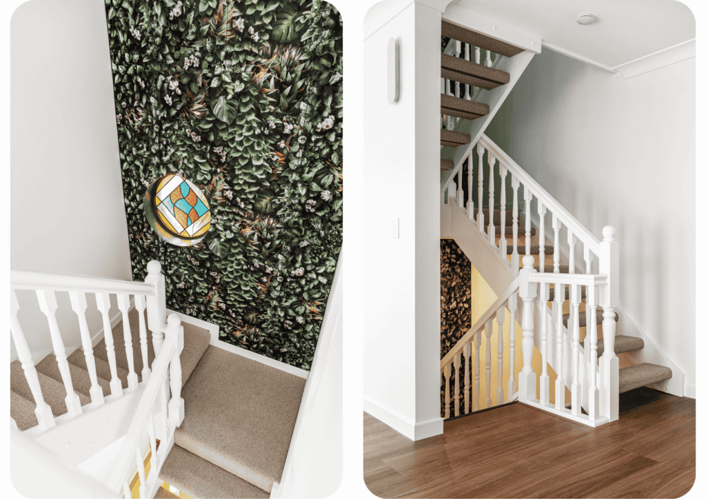 Left: White-painted stairwell with beige carpet and a striking feature wall of green leafy botanical wallpaper, accented by a round stained glass window.

Right: View of a modern white stairwell with beige carpet and timber flooring, showcasing a partial view of the leafy wallpapered wall beneath the staircase.
